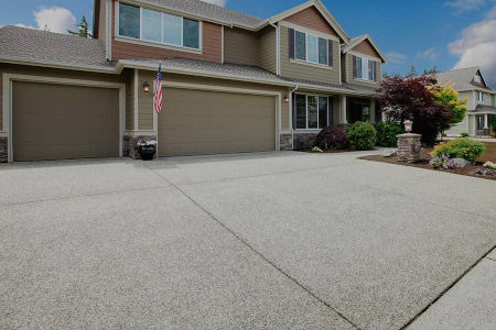 Driveway Cleaning: Removing Oil, Rust, and Battery Acid Stains Before They Set